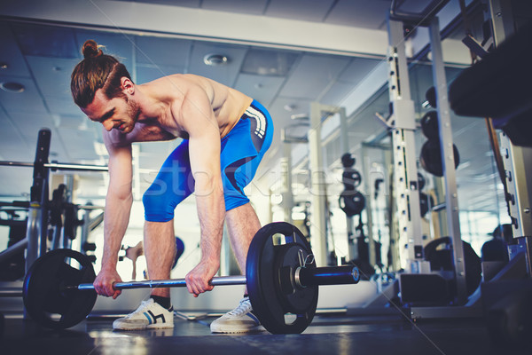 Foto stock: Fuerte · levantador · de · pesas · retrato · levantamiento · de · pesas · gimnasio