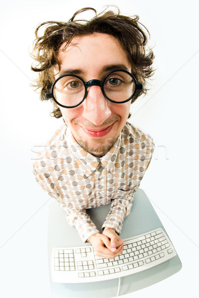 滑稽 男子 眼鏡 坐在 辦公桌 商業照片 © pressmaster