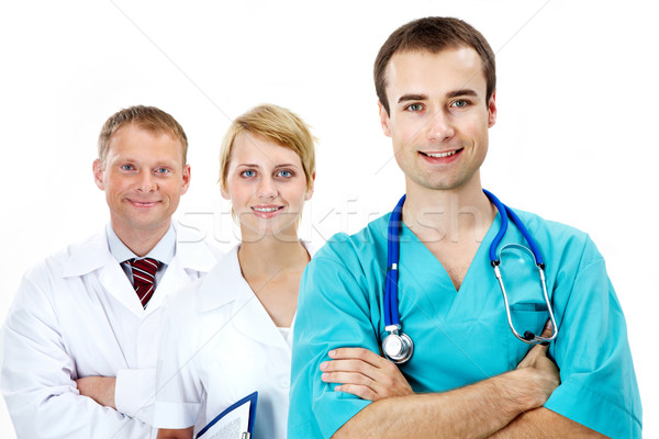 Kékgalléros munkások portré barátságos orvosok néz Stock fotó © pressmaster