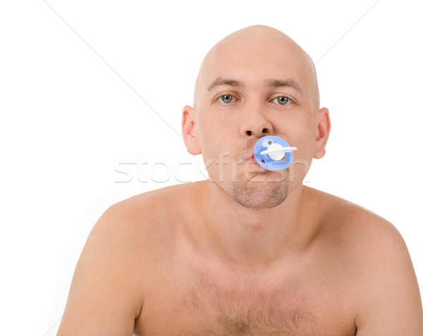 Baby człowiek pacyfikator usta patrząc kamery Zdjęcia stock © pressmaster