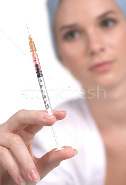 Injekció éles injekciós tű háziorvos kéz nő Stock fotó © pressmaster