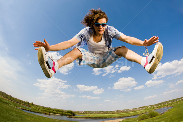 動態 傢伙 肖像 有活力 男子 跳躍 商業照片 © pressmaster