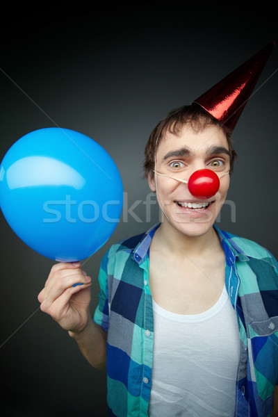 Léggömb fickó boldog tart mosolyog kamera Stock fotó © pressmaster