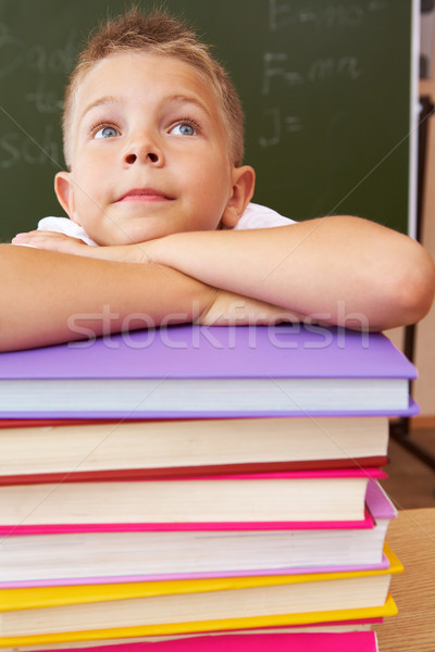 Könyvtár arc szorgalmas iskolás fiú néz fej Stock fotó © pressmaster