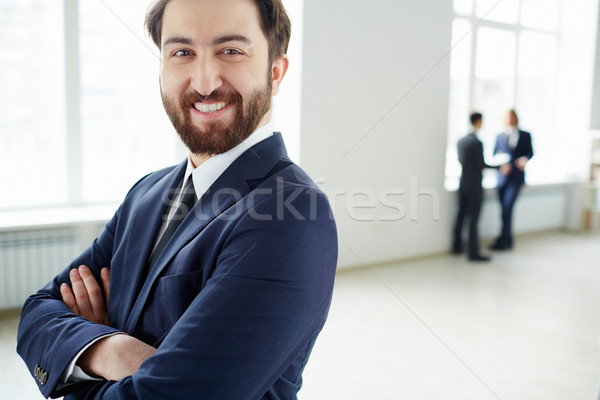 Elegante werkgever geslaagd zakenman naar camera Stockfoto © pressmaster