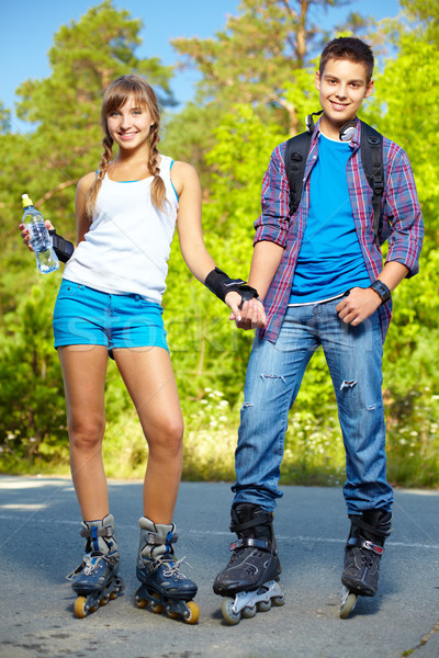 Couple on roller skates Stock photo © pressmaster