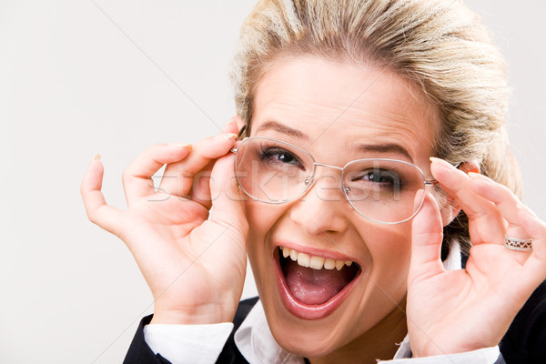 Râs femeie de afaceri portret atingere ochelari afaceri Imagine de stoc © pressmaster