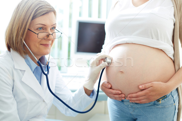Checking baby heartbeat Stock photo © pressmaster