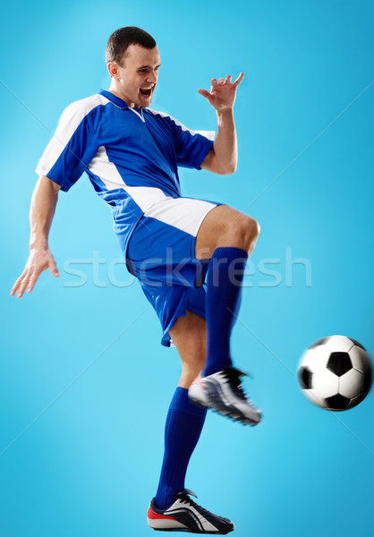 Footballeur portrait sport bleu balle jeunes Photo stock © pressmaster