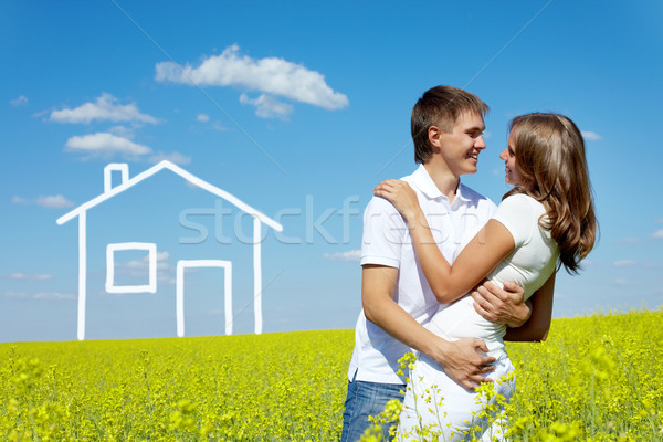 Affection image heureux couple prairie [[stock_photo]] © pressmaster