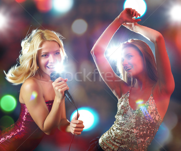 Cheering all night long Stock photo © pressmaster
