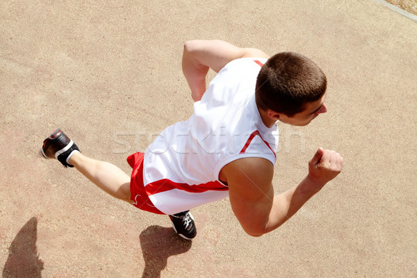 Jogging Fotografia mężczyzna odzież sportowa uruchomiony stadion Zdjęcia stock © pressmaster