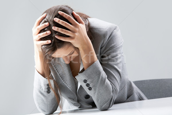 Stock photo: Troubled woman