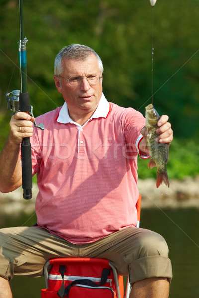 Foto stock: Pescador · foto · altos · hombre · peces · fin · de · semana