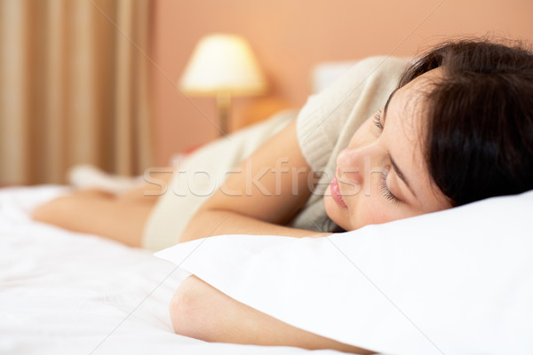 Békés idő derűs lány ágy otthon Stock fotó © pressmaster