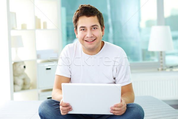 Stockfoto: Positief · man · laptop · glimlachend · vent · naar