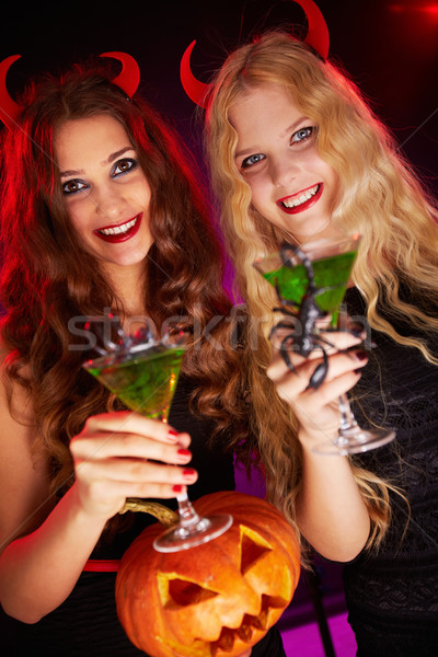 Halloween buli fotó mosolyog nők tart Stock fotó © pressmaster