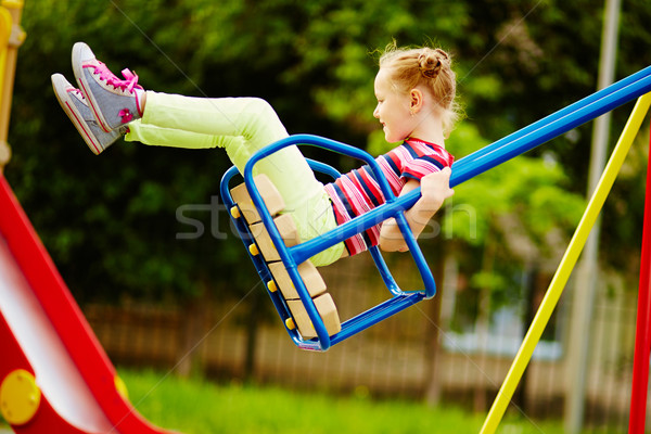 Girl on swing Stock photo © pressmaster