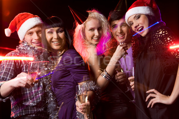 Vrienden bedrijf clubbing disco fluiten champagne Stockfoto © pressmaster