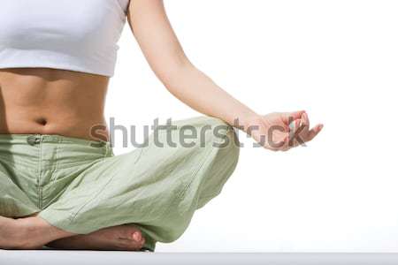 Lotus benen vrouwelijke hand knie Stockfoto © pressmaster