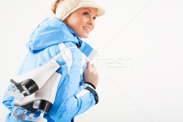 Téli hobbi portré fiatal nő tart korcsolya Stock fotó © pressmaster