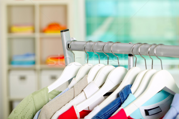 Clothes on hangers Stock photo © pressmaster