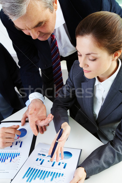 Stock photo: Discussion of papers 
