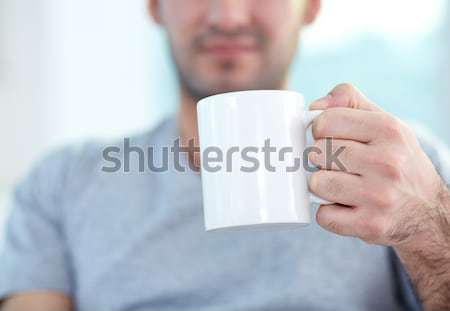 Caneca masculino mão café Foto stock © pressmaster