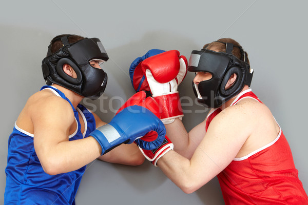 Fighting in helmets Stock photo © pressmaster