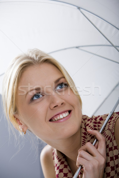 Paraguas sonrisa nina sonriendo mujeres feliz Foto stock © pressmaster