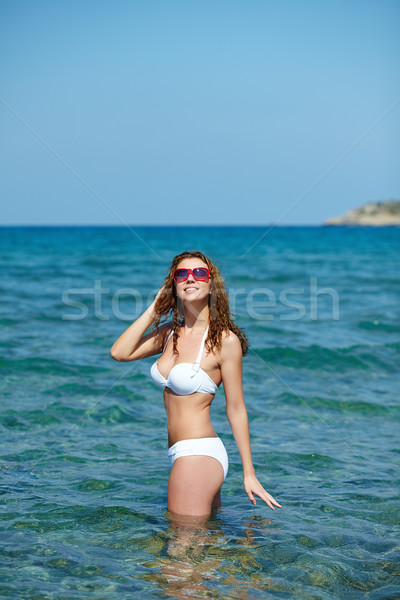 Girl standing in water Stock photo © pressmaster