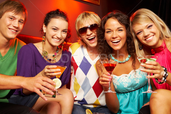 Boldog barátok portré fiatalok martini szemüveg Stock fotó © pressmaster