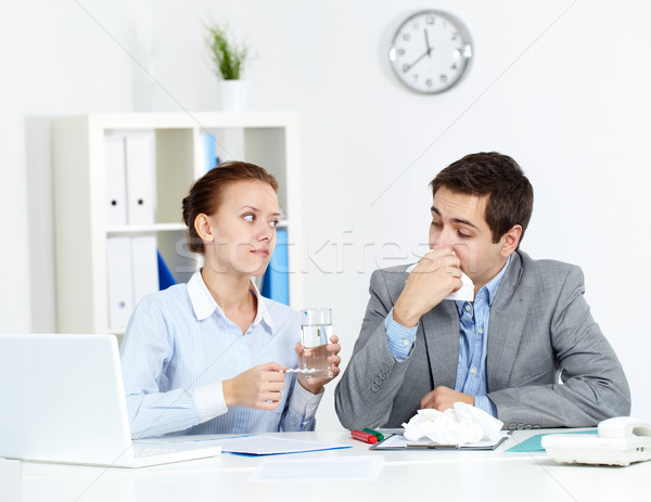 Taking care of sick co-worker Stock photo © pressmaster