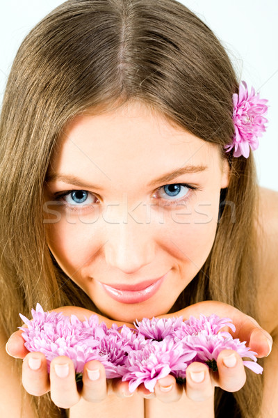 Stock photo: Girl with flowers 