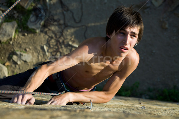 Adrenalin fotó férfi mászik felfelé hegy Stock fotó © pressmaster