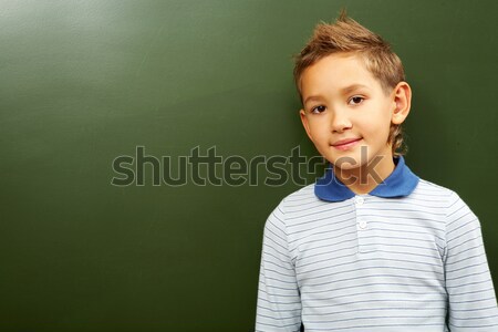 Boy at blackboard Stock photo © pressmaster