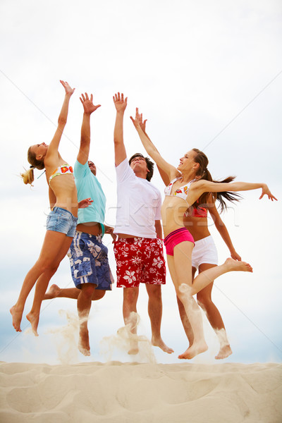 ストックフォト: 高跳び · 写真 · 5 · 友達 · 砂浜 · 男