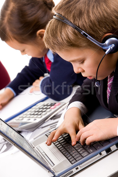 Lad typing Stock photo © pressmaster