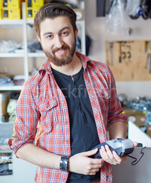 Man at the cash register Stock photo © pressmaster