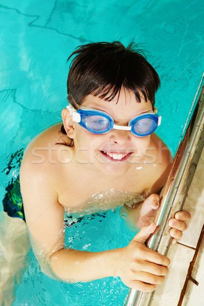 Boy in pool Stock photo © pressmaster