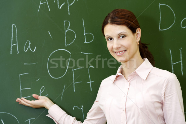 スマート 教師 肖像 ポインティング 文字 黒板 ストックフォト © pressmaster