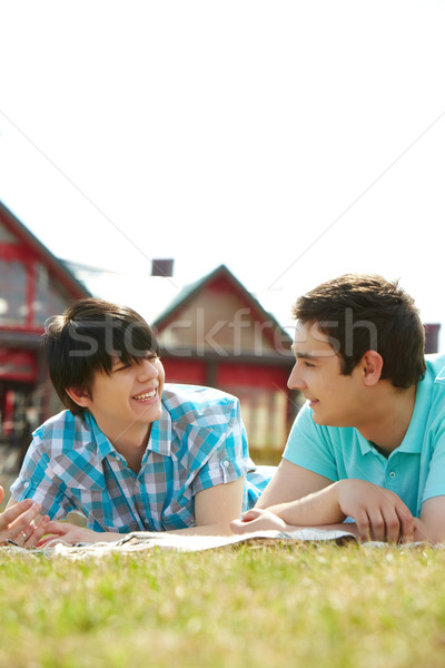 Pelouse jeunes ensemble gay relations herbe [[stock_photo]] © pressmaster