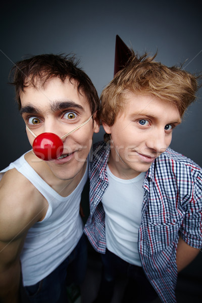 Kettő srácok szórakozás készít arcok kamera Stock fotó © pressmaster