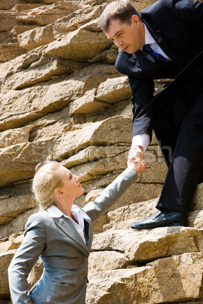 Stockfoto: Helpen · afbeelding · zakenman · permanente · blond