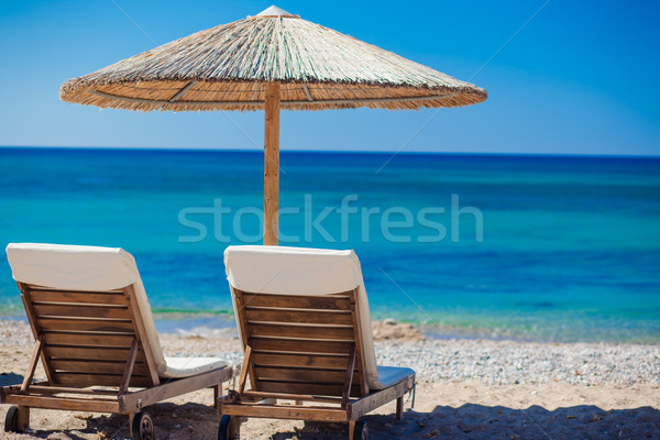 Stock photo: view of the beach with chairs and umbrellas