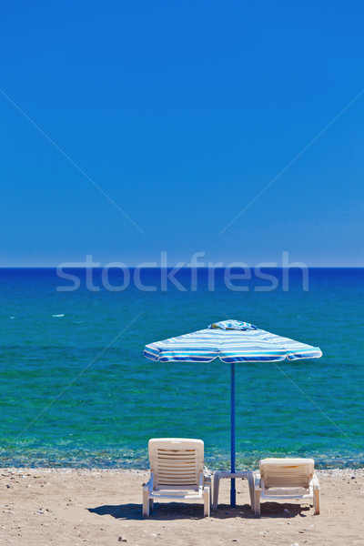 Stock photo: view of the beach with chairs and umbrellas
