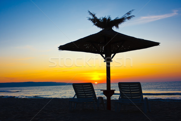 海灘 視圖 椅子 雨傘 天空 日落 商業照片 © prg0383