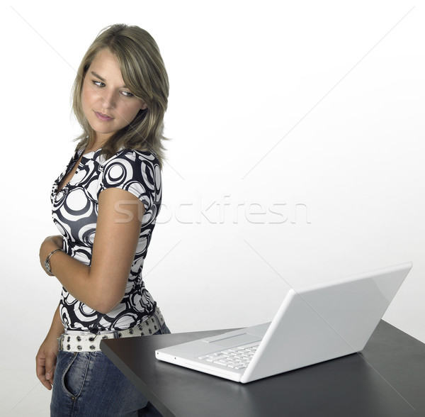 young cute girl turns away from laptop Stock photo © prill