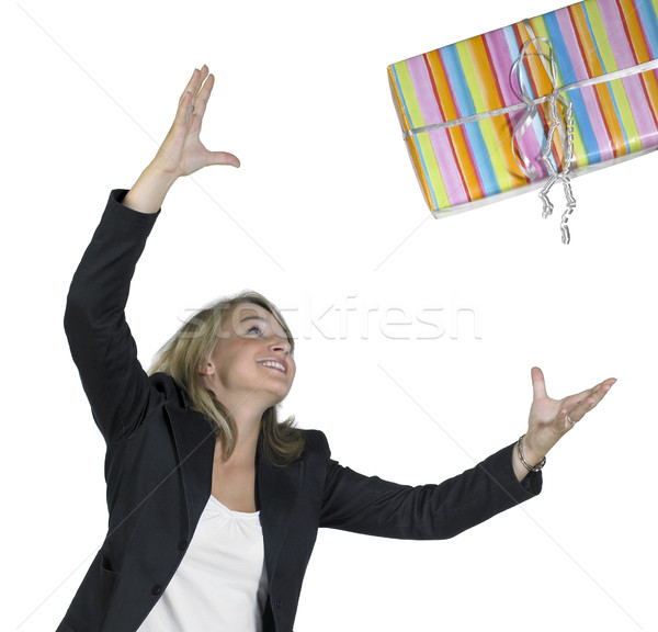blond girl is throwing a present Stock photo © prill