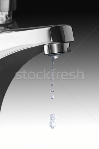 dripping faucet and water drops Stock photo © prill